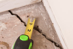 measuring a crack in a foundation